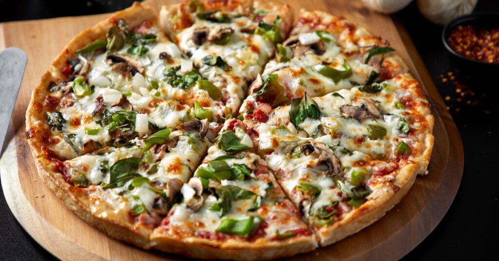 Oversized Monster Slice pizza from Papa Ray’s for party trays