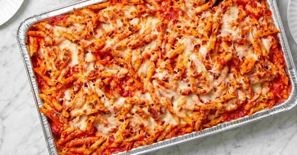 Papa Ray’s delivery for group catering with pizza, wings, and pasta trays
