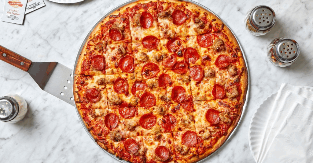 ALT: “Papa Ray’s catering pizza trays in Naperville for party events”