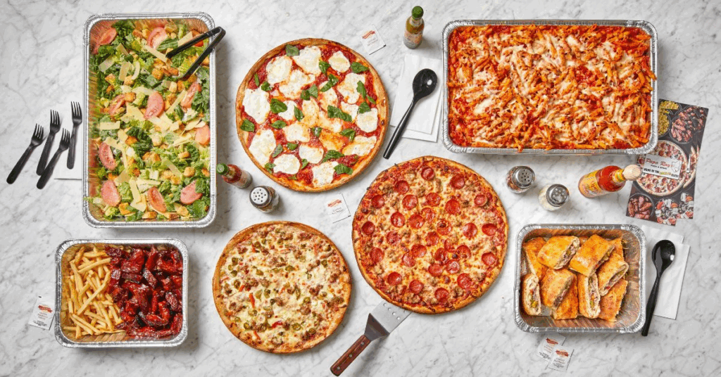 ALT: “Papa Ray’s Naperville pizza bundle with wings and pasta trays”