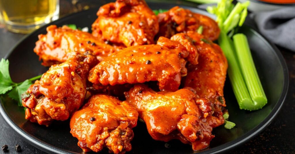 Buffalo wings with dipping sauce served fresh