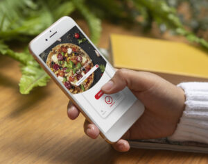 close up hand holding device scaled e1762968667856