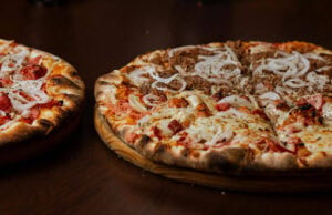 Cheap Comfort Food Near Me: Filling Meals That Won’t Break the Bank 1 Variety of specialty pizzas with different toppings.