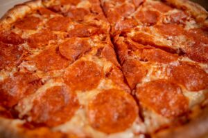 The Original Chicago Pizza in Cook County: What Makes It So Iconic? 1 Golden-crusted deep-dish pizza sliced and ready to serve.