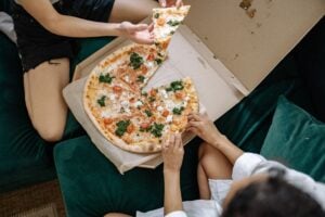 Family Pizza Deals Near Me: Delicious Meals That Everyone Can Enjoy 1 Family-size pizza box open on a kitchen table.