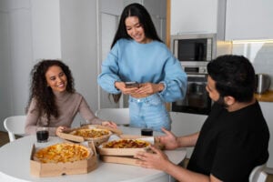 Order To-Go Food Near Me: Easy Meals for Busy Days and Last-Minute Cravings 2 Takeout bags and pizza box packed for pickup